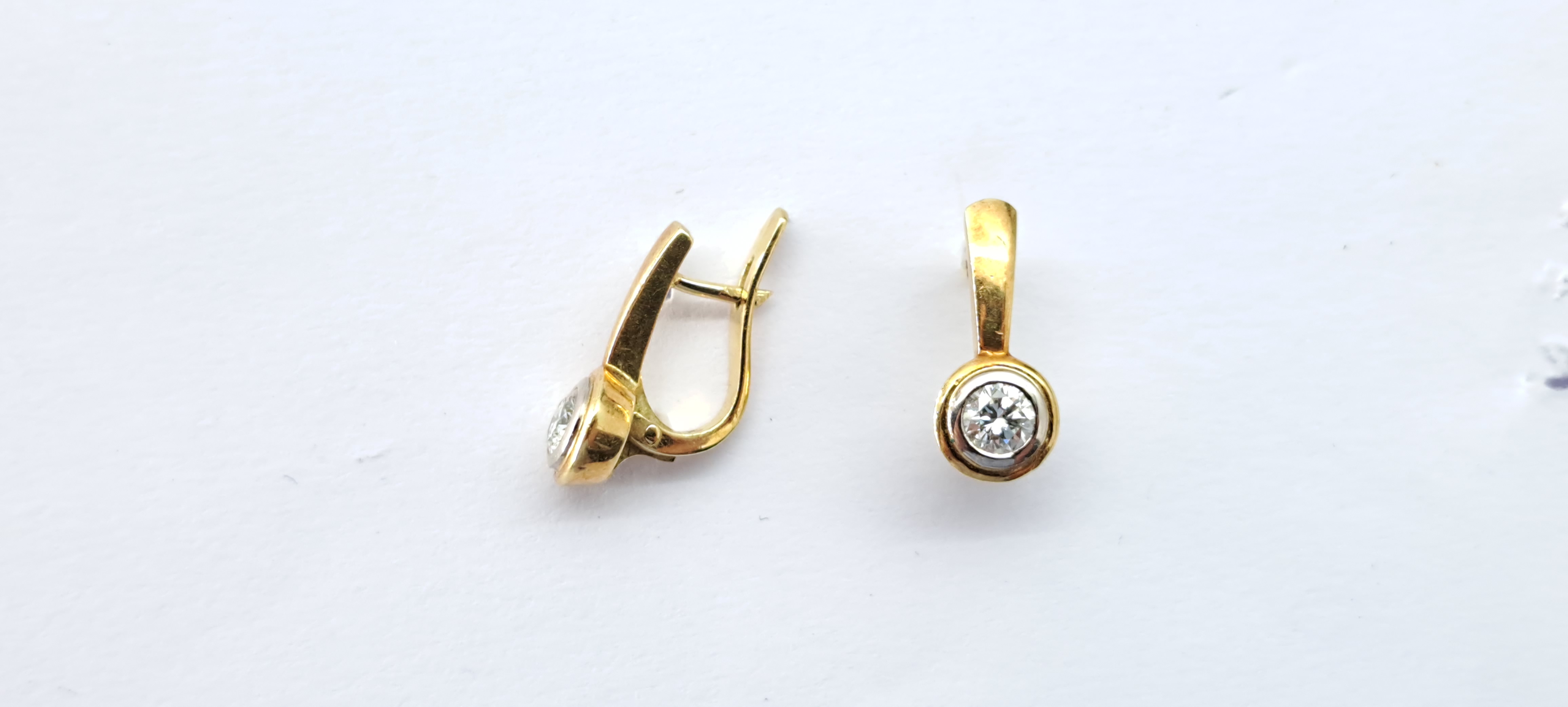 PENDIENTES CHATONES COLGANTES EN MIXTO DE 18KT Y BRILLANTES. 0.50CTS